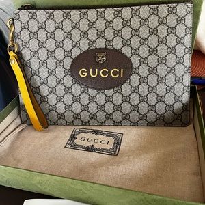 Gucci supreme tiger wristlet clutch